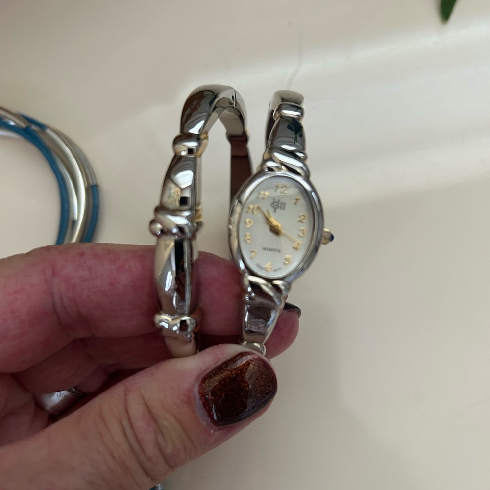 Elegant Silver Women's Watch and Bangle set